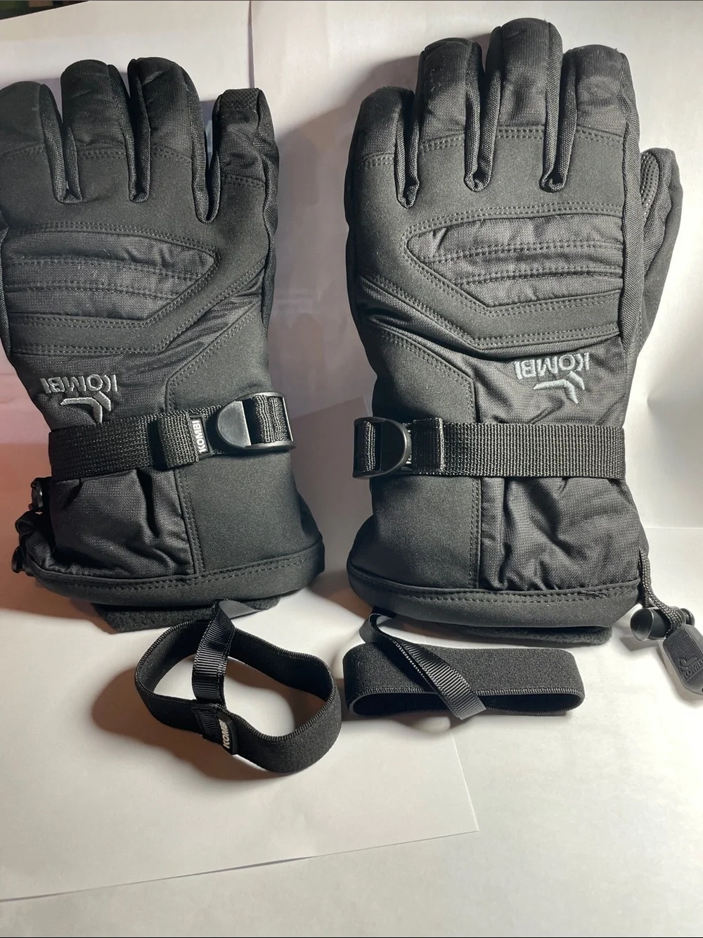 Women’s Black Kombi Cuff Gloves, size small, with wrist straps loss protection.
